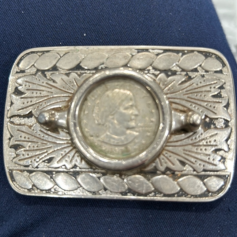 Silver belt buckle with coin